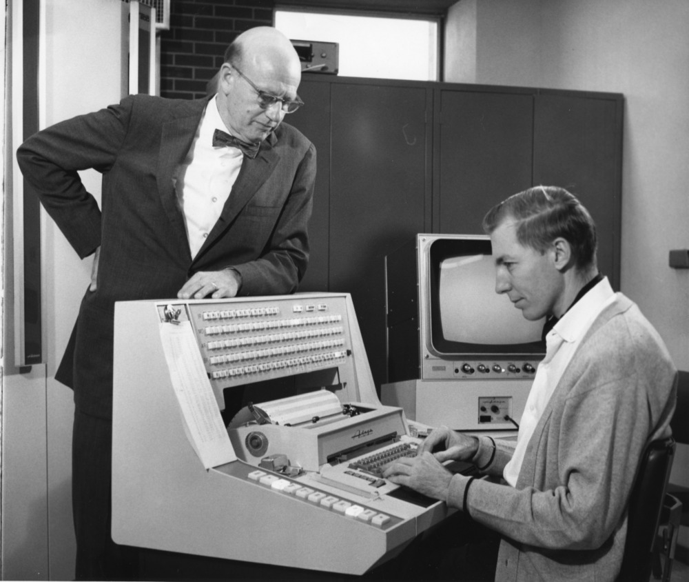 Dr. Henry L. Lucas and Donald C. Martin using "Tomorrow's Computer"